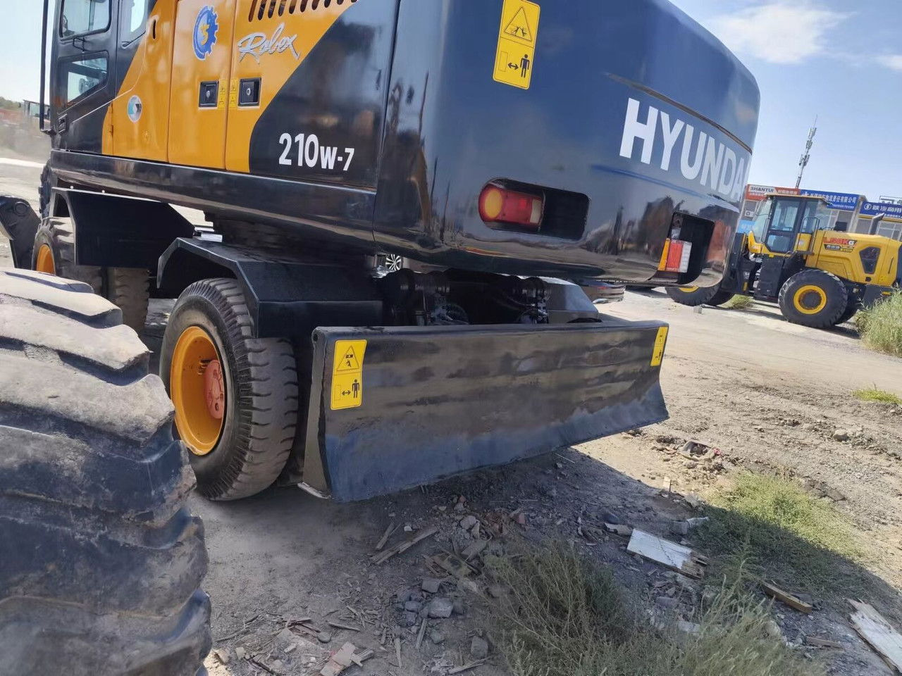 Hyundai R210-7 - Tekerlekli ekskavatör: fotoğraf 3 Hyundai R210-7 - Tekerlekli ekskavatör: fotoğraf 3