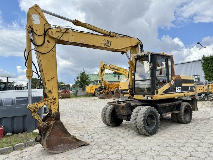 CAT M318 - Tekerlekli ekskavatör: fotoğraf 2 CAT M318 - Tekerlekli ekskavatör: fotoğraf 2