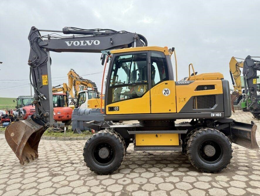 Volvo EW140D - Tekerlekli ekskavatör: fotoğraf 1 Volvo EW140D - Tekerlekli ekskavatör: fotoğraf 1