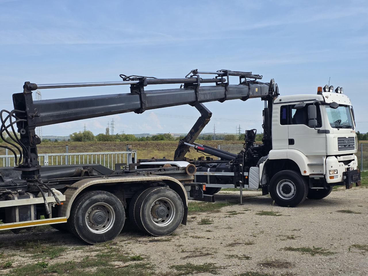 MAN TGA 26.440 6X6 / HOOK SYSTEM / HIAB 166D REMOTE - Kancalı yükleyici kamyon, Vinçli kamyon: fotoğraf 4 MAN TGA 26.440 6X6 / HOOK SYSTEM / HIAB 166D REMOTE - Kancalı yükleyici kamyon, Vinçli kamyon: fotoğraf 4