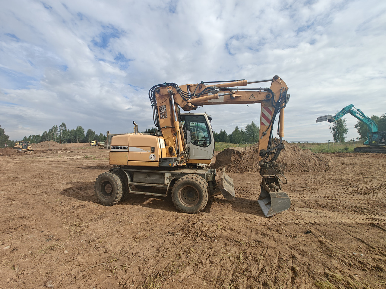 LIEBHERR A312 - Tekerlekli ekskavatör: fotoğraf 3 LIEBHERR A312 - Tekerlekli ekskavatör: fotoğraf 3