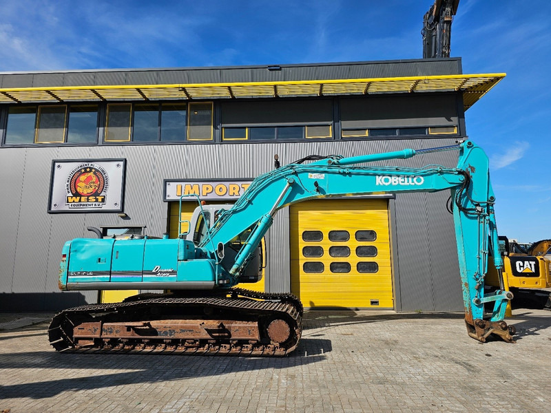 Kobelco SK210LC-6 - Paletli ekskavatör: fotoğraf 5 Kobelco SK210LC-6 - Paletli ekskavatör: fotoğraf 5