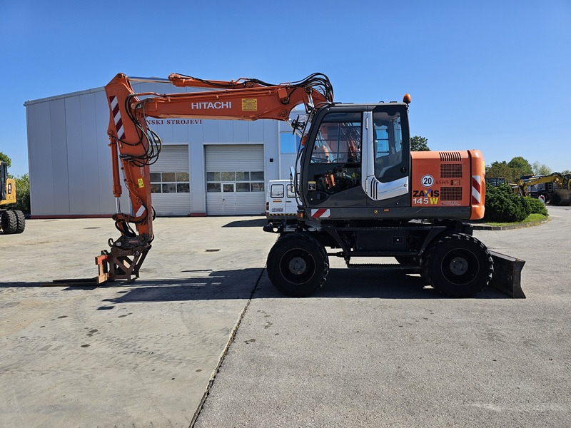 HITACHI ZX145W-3 - Tekerlekli ekskavatör: fotoğraf 1 HITACHI ZX145W-3 - Tekerlekli ekskavatör: fotoğraf 1