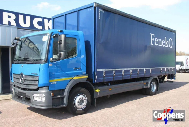 Mercedes-Benz Atego 1318L Euro 6 - Tenteli kamyon: fotoğraf 1 Mercedes-Benz Atego 1318L Euro 6 - Tenteli kamyon: fotoğraf 1