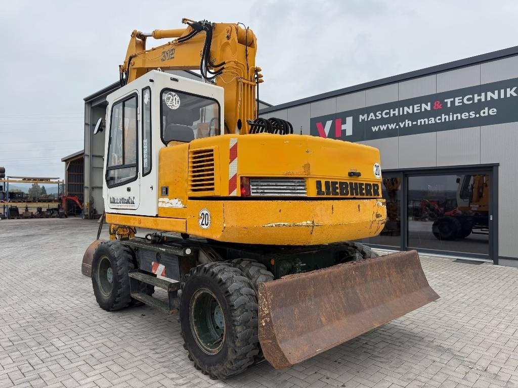 Liebherr A 312  - Tekerlekli ekskavatör: fotoğraf 3 Liebherr A 312  - Tekerlekli ekskavatör: fotoğraf 3