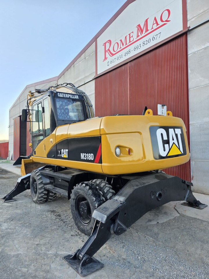 CAT M318D - Tekerlekli ekskavatör: fotoğraf 2 CAT M318D - Tekerlekli ekskavatör: fotoğraf 2
