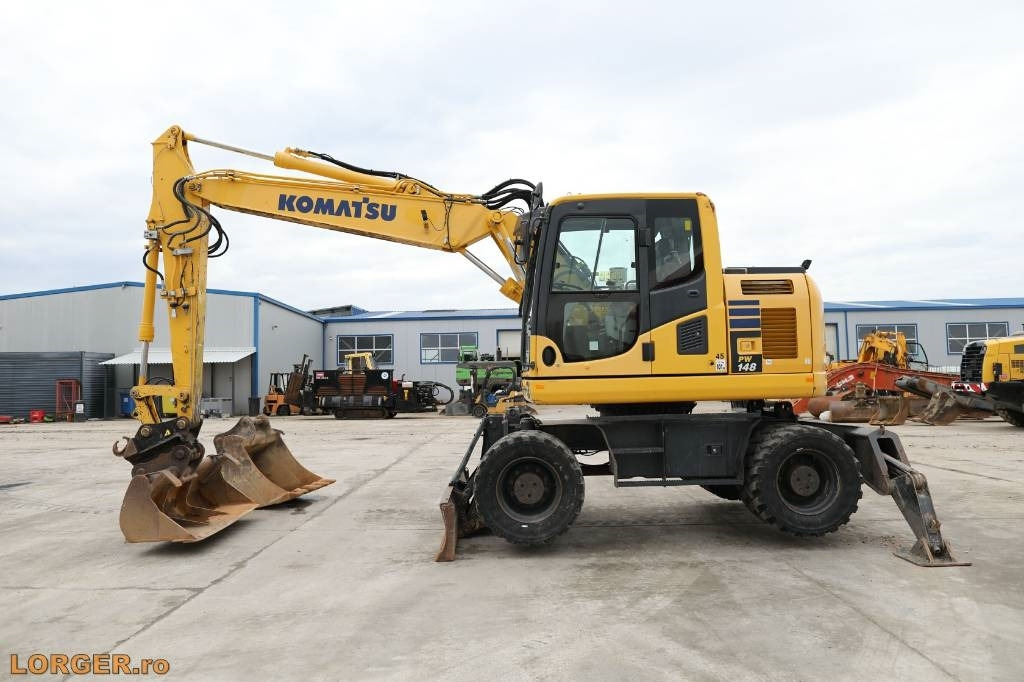 Komatsu PW 148-10 - Tekerlekli ekskavatör: fotoğraf 1 Komatsu PW 148-10 - Tekerlekli ekskavatör: fotoğraf 1