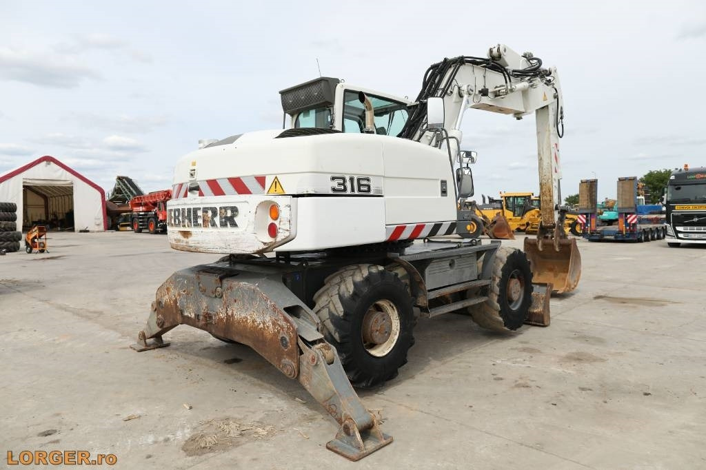 Liebherr A 316 Litronic - Tekerlekli ekskavatör: fotoğraf 2 Liebherr A 316 Litronic - Tekerlekli ekskavatör: fotoğraf 2