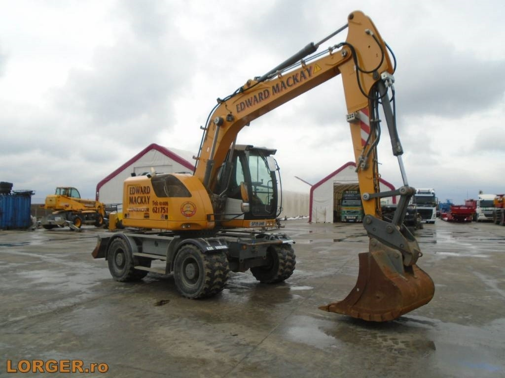 Tekerlekli ekskavatör Liebherr A 914: fotoğraf 6