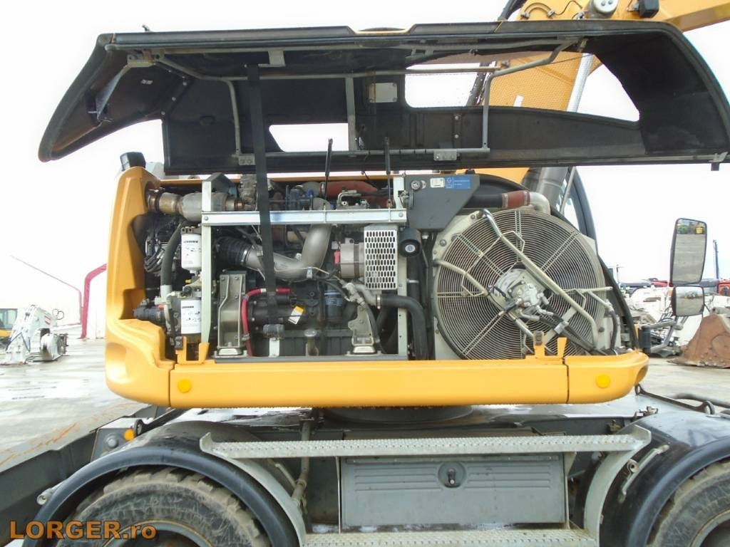 Tekerlekli ekskavatör Liebherr A 914: fotoğraf 8