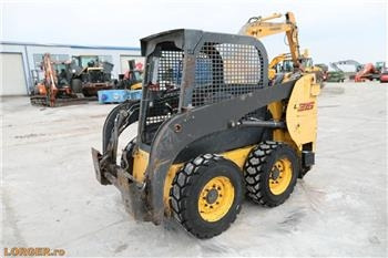 New Holland L 215 - Mini yükleyici: fotoğraf 1 New Holland L 215 - Mini yükleyici: fotoğraf 1