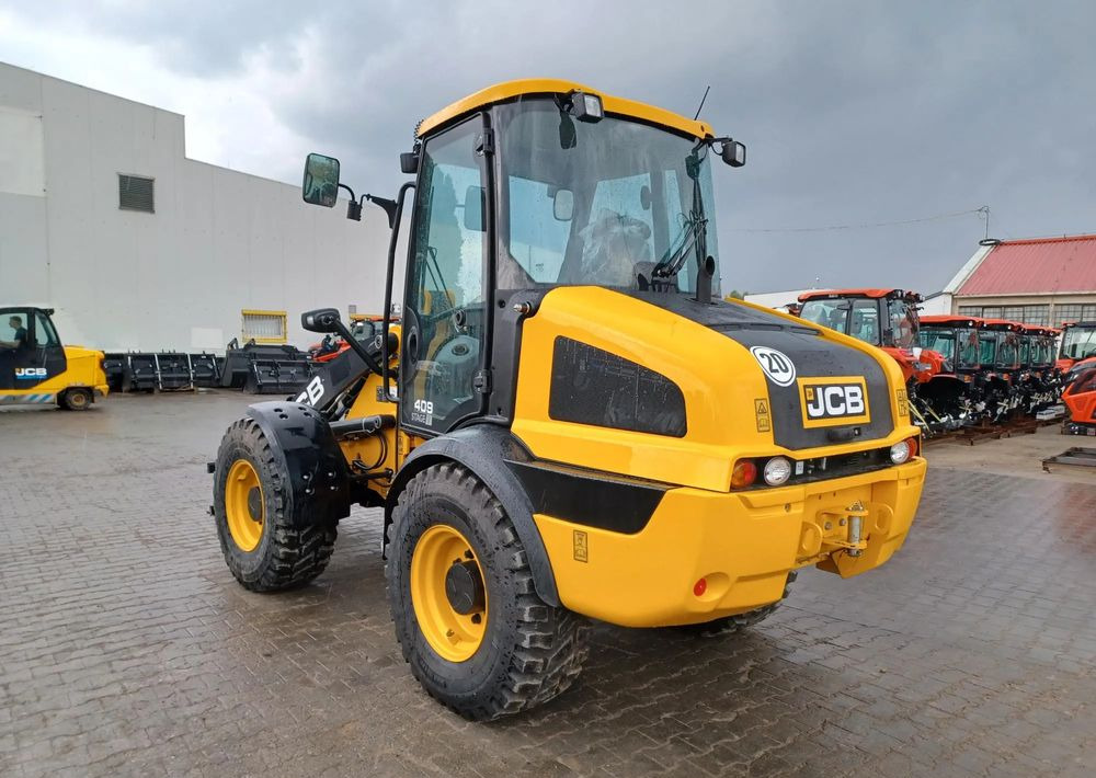 JCB 409 - Tekerlekli yükleyici: fotoğraf 5 JCB 409 - Tekerlekli yükleyici: fotoğraf 5