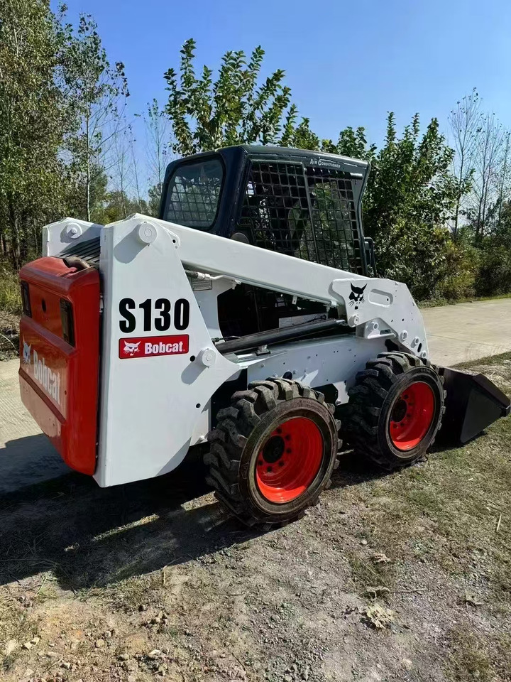 Bobcat S130 - Mini yükleyici: fotoğraf 1 Bobcat S130 - Mini yükleyici: fotoğraf 1