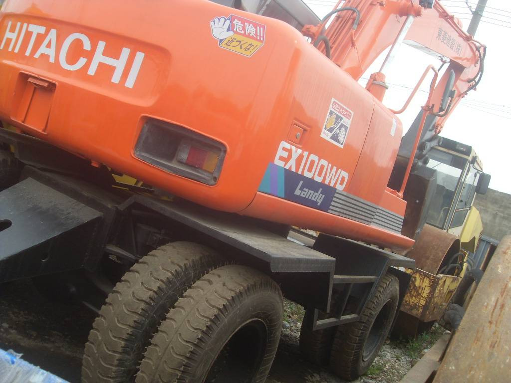 Hitachi EX100WD-3 - Tekerlekli ekskavatör: fotoğraf 1 Hitachi EX100WD-3 - Tekerlekli ekskavatör: fotoğraf 1