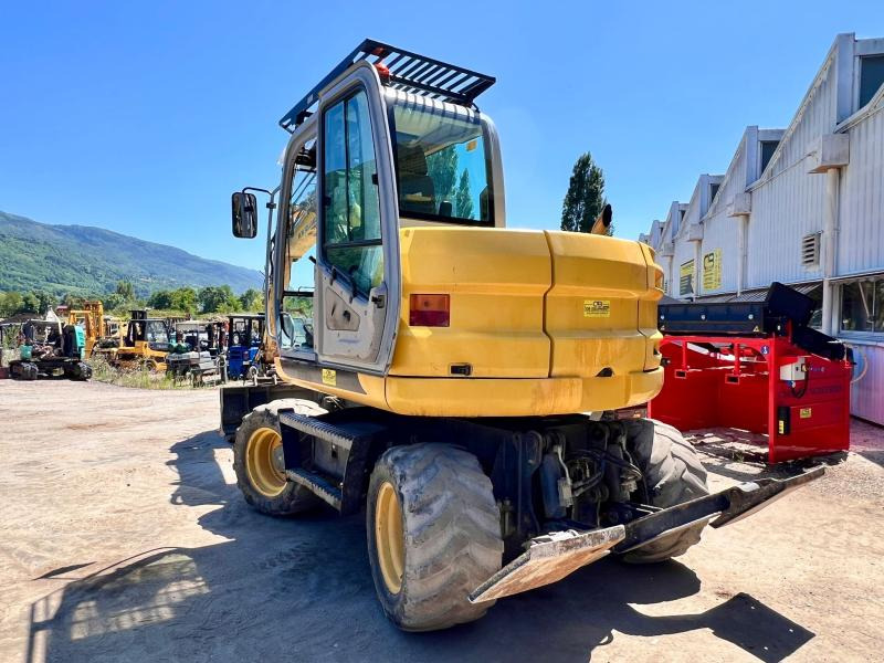 New Holland MH 2.6 PELLE A PNEUS 10T - Tekerlekli ekskavatör: fotoğraf 3 New Holland MH 2.6 PELLE A PNEUS 10T - Tekerlekli ekskavatör: fotoğraf 3