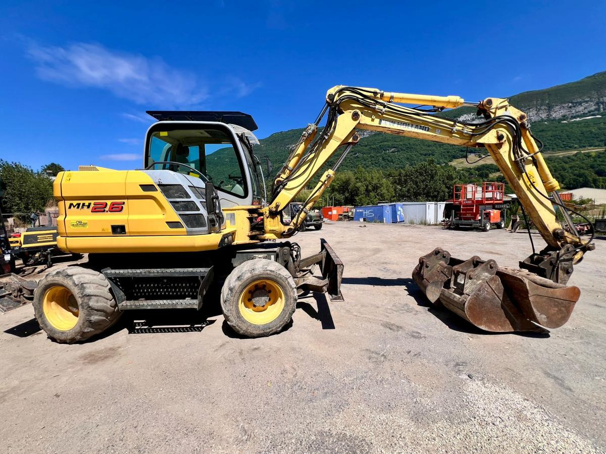 New Holland MH 2.6 PELLE A PNEUS 10T - Tekerlekli ekskavatör: fotoğraf 5 New Holland MH 2.6 PELLE A PNEUS 10T - Tekerlekli ekskavatör: fotoğraf 5