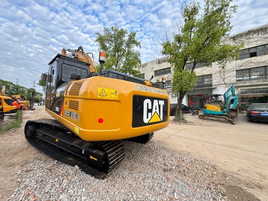 Paletli ekskavatör CAT 324 D: fotoğraf 11