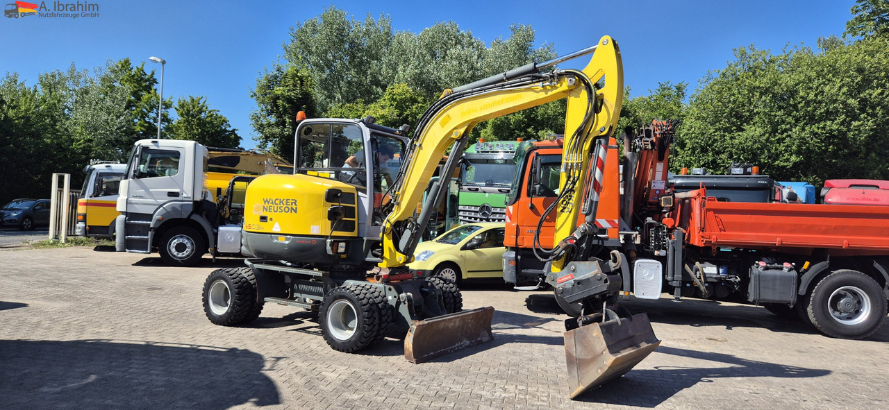 Wacker Neuson 6503 E05-07 schnellwechsler mit Oilquick | VERSTELLAUSLEGER | Klima | 2 Löffel - Tekerlekli ekskavatör: fotoğraf 1 Wacker Neuson 6503 E05-07 schnellwechsler mit Oilquick | VERSTELLAUSLEGER | Klima | 2 Löffel - Tekerlekli ekskavatör: fotoğraf 1