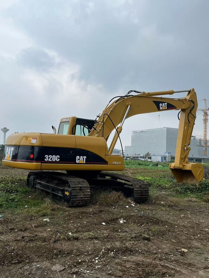 Caterpillar 320C - Paletli ekskavatör: fotoğraf 1 Caterpillar 320C - Paletli ekskavatör: fotoğraf 1