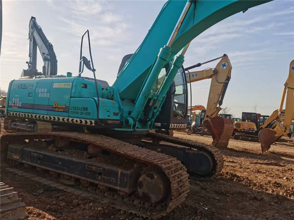 Kobelco SK210LC - Paletli ekskavatör: fotoğraf 1 Kobelco SK210LC - Paletli ekskavatör: fotoğraf 1
