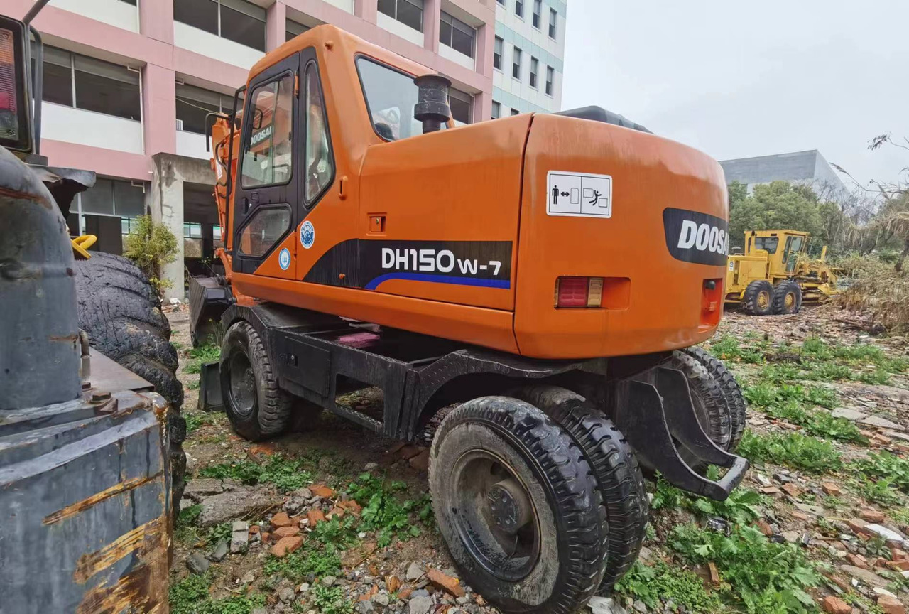 DOOSAN DH150W-7 - Tekerlekli ekskavatör: fotoğraf 5 DOOSAN DH150W-7 - Tekerlekli ekskavatör: fotoğraf 5