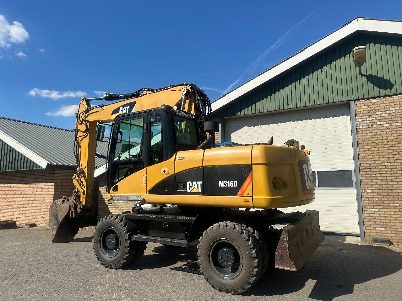 Caterpillar M316D - Tekerlekli yükleyici: fotoğraf 2 Caterpillar M316D - Tekerlekli yükleyici: fotoğraf 2