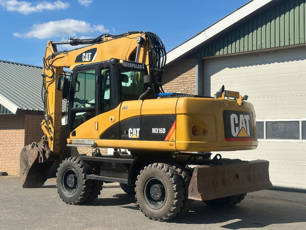 Caterpillar M316D - Tekerlekli yükleyici: fotoğraf 3 Caterpillar M316D - Tekerlekli yükleyici: fotoğraf 3