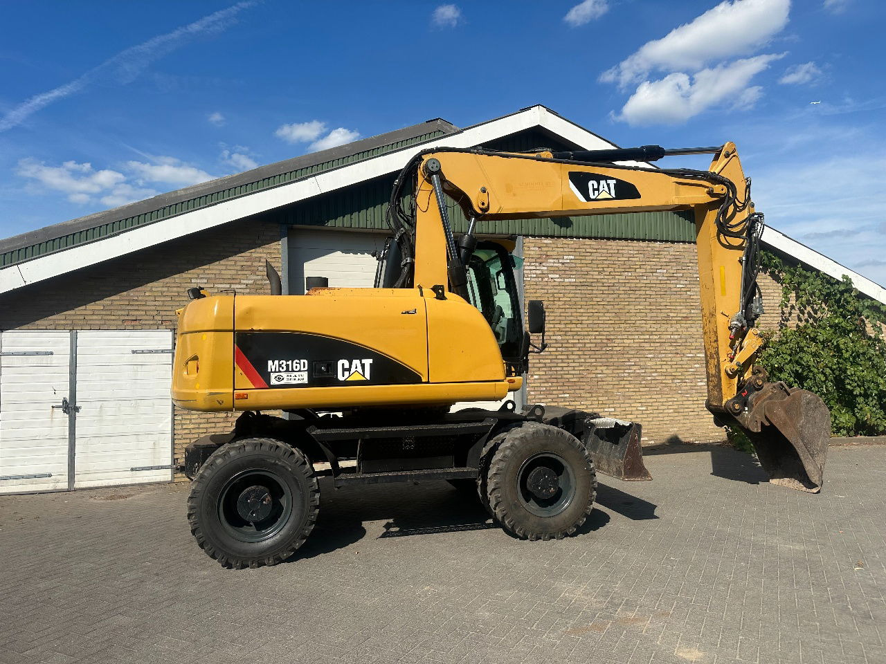 Caterpillar M316D - Tekerlekli yükleyici: fotoğraf 5 Caterpillar M316D - Tekerlekli yükleyici: fotoğraf 5