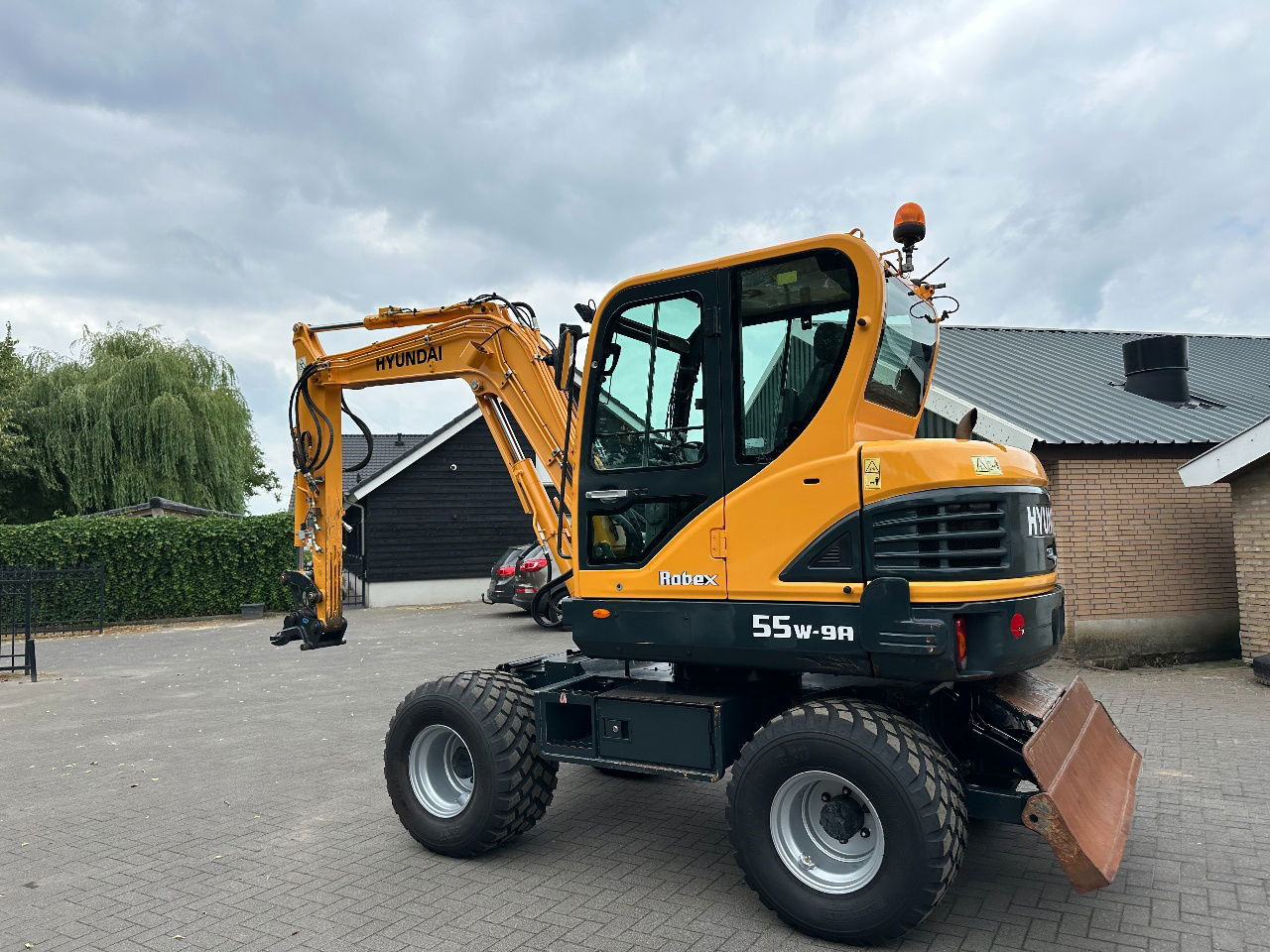 Hyundai 55W-9A - Tekerlekli ekskavatör: fotoğraf 3 Hyundai 55W-9A - Tekerlekli ekskavatör: fotoğraf 3