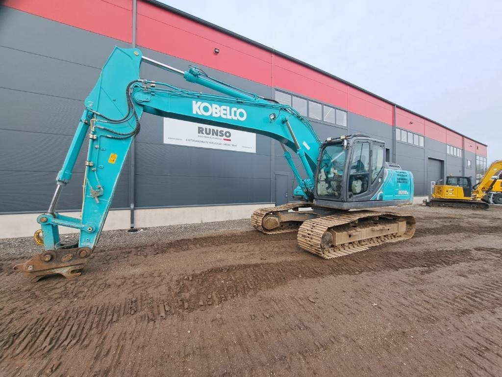Kobelco SK 210-10 - Paletli ekskavatör: fotoğraf 1 Kobelco SK 210-10 - Paletli ekskavatör: fotoğraf 1