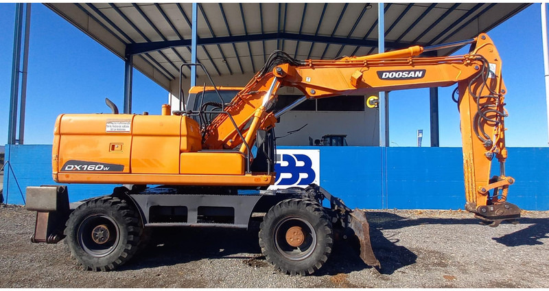 Doosan DX140W-3 *coming soon* - Tekerlekli ekskavatör: fotoğraf 2 Doosan DX140W-3 *coming soon* - Tekerlekli ekskavatör: fotoğraf 2