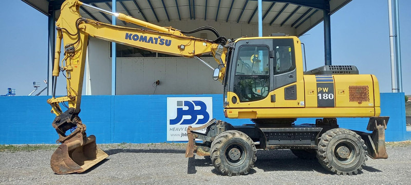 Komatsu PW180-7EO - Tekerlekli ekskavatör: fotoğraf 1 Komatsu PW180-7EO - Tekerlekli ekskavatör: fotoğraf 1