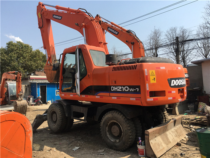 Doosan DH210w-7 wheel excavator - Tekerlekli ekskavatör: fotoğraf 4 Doosan DH210w-7 wheel excavator - Tekerlekli ekskavatör: fotoğraf 4