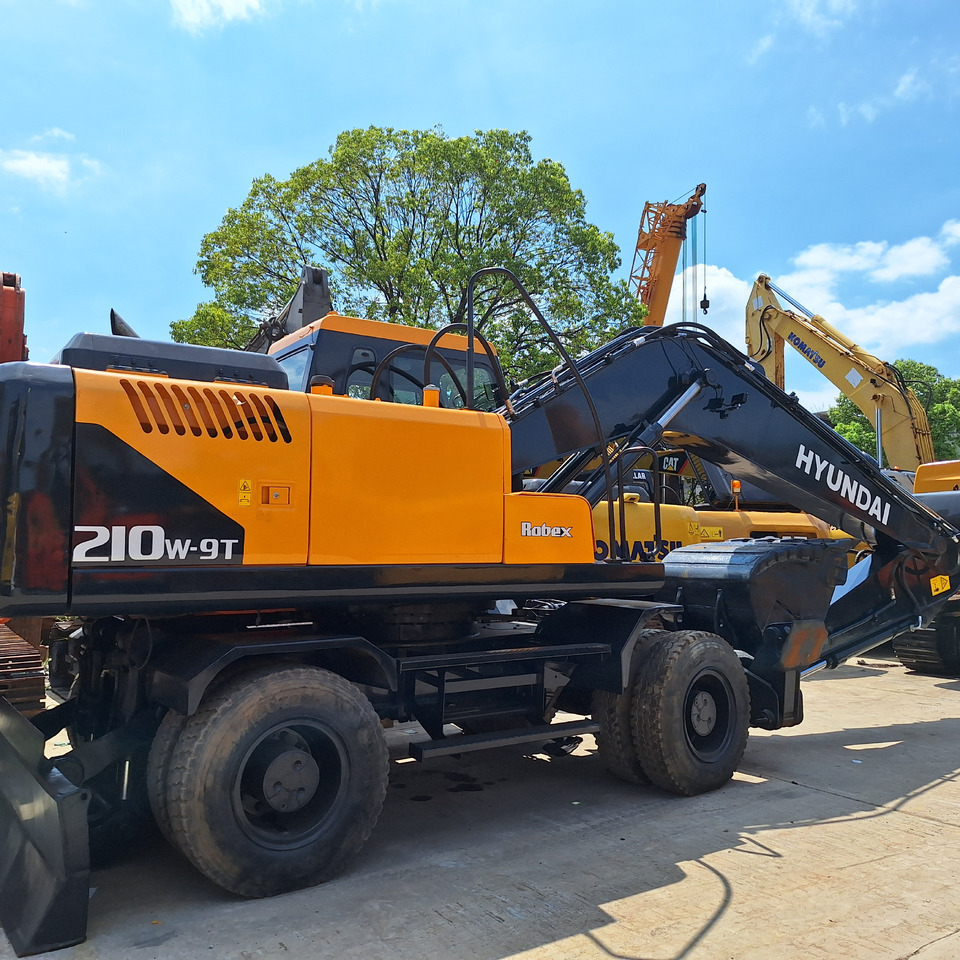 Hyundai 210w-9T wheel excavator - Tekerlekli ekskavatör: fotoğraf 1 Hyundai 210w-9T wheel excavator - Tekerlekli ekskavatör: fotoğraf 1