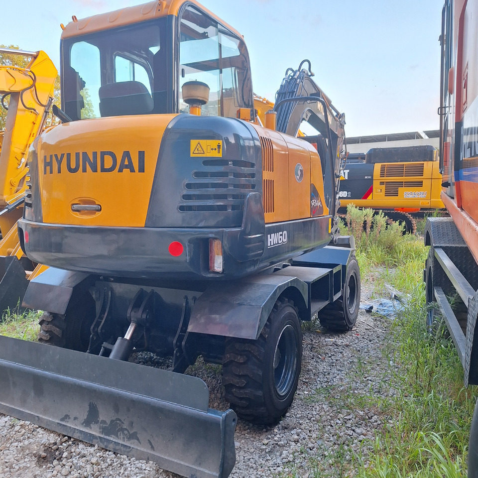Hyundai 60vs excavator - Tekerlekli ekskavatör: fotoğraf 2 Hyundai 60vs excavator - Tekerlekli ekskavatör: fotoğraf 2
