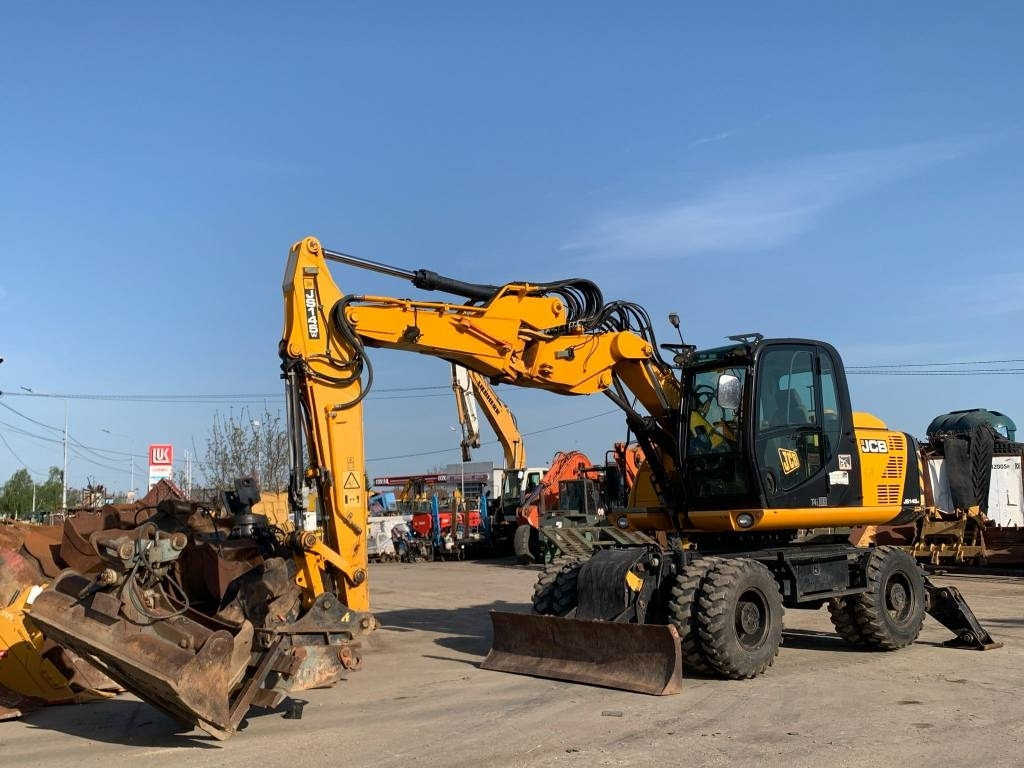 JCB JS 145 W - Tekerlekli ekskavatör: fotoğraf 1 JCB JS 145 W - Tekerlekli ekskavatör: fotoğraf 1