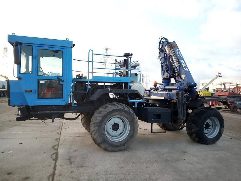 Mercedes-Benz Unimog - Vinçli kamyon: fotoğraf 2 Mercedes-Benz Unimog - Vinçli kamyon: fotoğraf 2