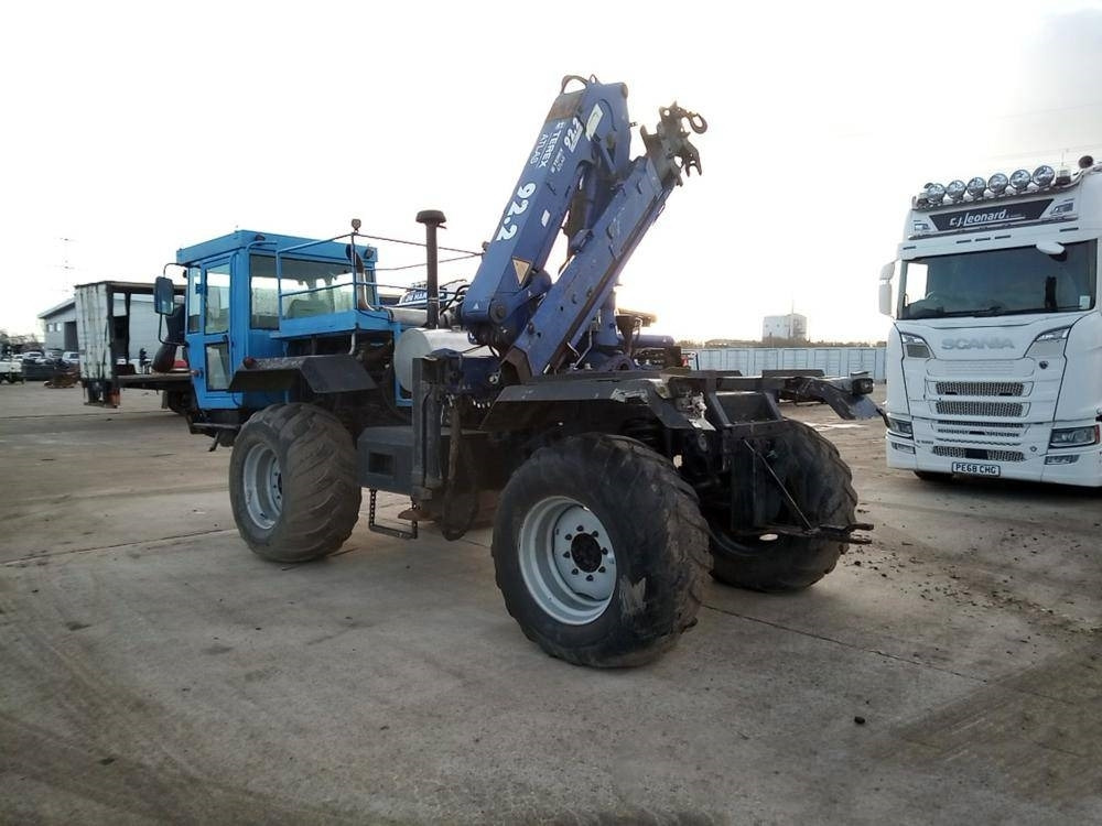 Mercedes-Benz Unimog - Vinçli kamyon: fotoğraf 3 Mercedes-Benz Unimog - Vinçli kamyon: fotoğraf 3
