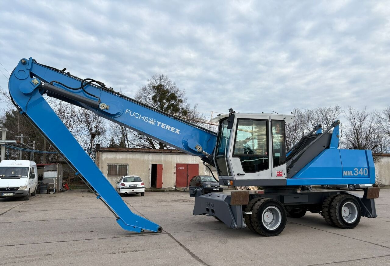 Terex-Fuchs MHL 340 C - Elleçleme makinesi: fotoğraf 1 Terex-Fuchs MHL 340 C - Elleçleme makinesi: fotoğraf 1