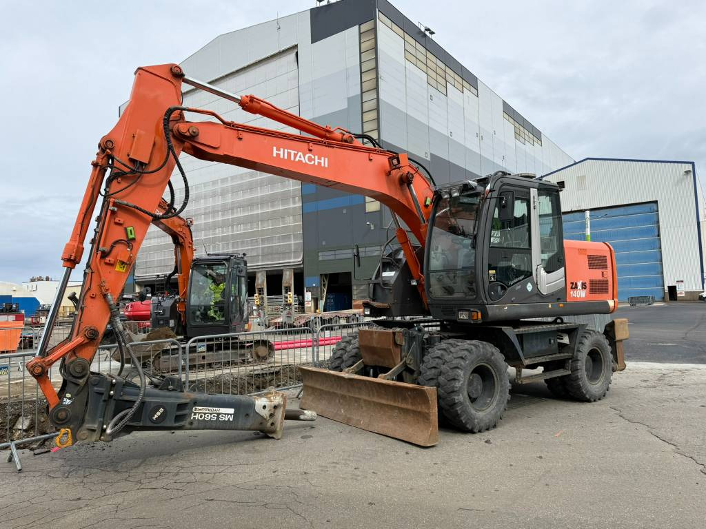 Hitachi ZX 140 W-3 - Tekerlekli ekskavatör: fotoğraf 1 Hitachi ZX 140 W-3 - Tekerlekli ekskavatör: fotoğraf 1