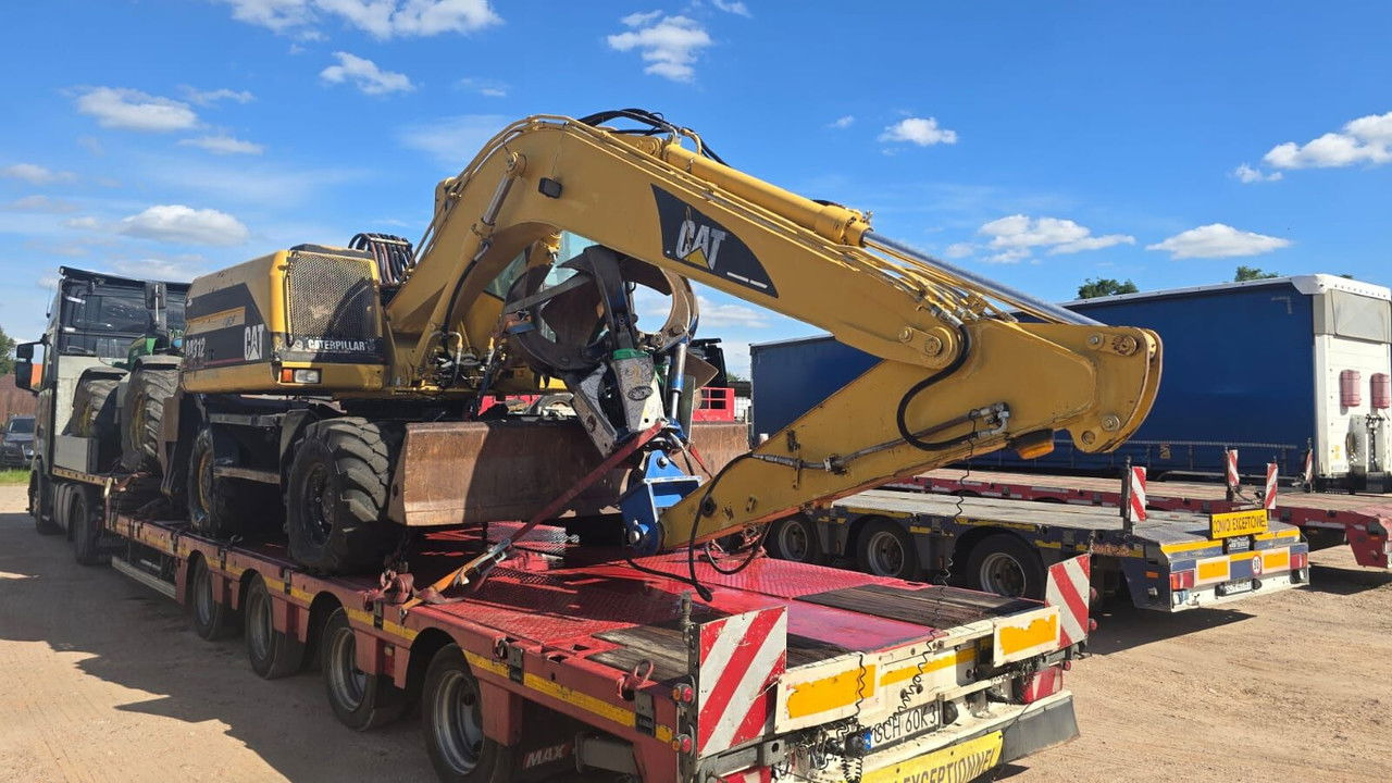 Caterpillar M312 Koparka PrzeŁAdunkowa Czerpak Świeżo Sprowadz ona - Tekerlekli ekskavatör: fotoğraf 1 Caterpillar M312 Koparka PrzeŁAdunkowa Czerpak Świeżo Sprowadz ona - Tekerlekli ekskavatör: fotoğraf 1