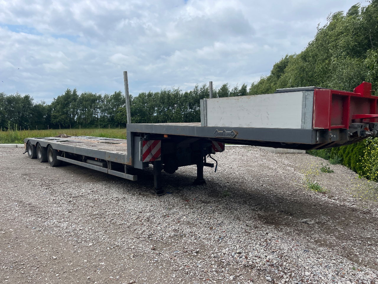 Nooteboom Mco-48-03 V uitschuifbaar hydrolisch gestuurd semi dieplader - Alçak çerçeveli platform dorse: fotoğraf 1 Nooteboom Mco-48-03 V uitschuifbaar hydrolisch gestuurd semi dieplader - Alçak çerçeveli platform dorse: fotoğraf 1