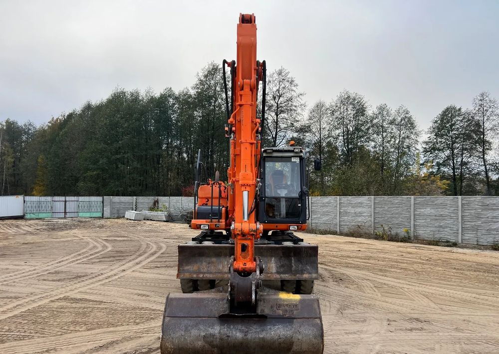 Doosan DX140W-3 - Tekerlekli ekskavatör: fotoğraf 3 Doosan DX140W-3 - Tekerlekli ekskavatör: fotoğraf 3