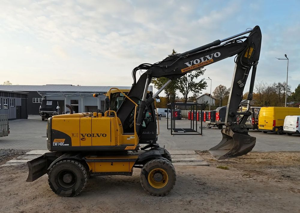 Tekerlekli ekskavatör Volvo EW 140C | ROTOTILT: fotoğraf 9