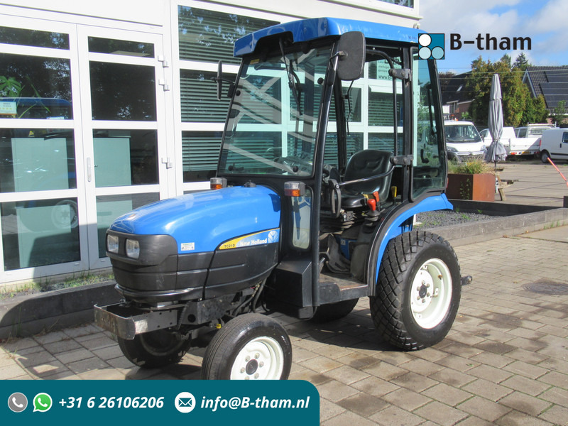 New Holland TC21D 4WD 4x4 Cabine Verwarming - Traktör: fotoğraf 1 New Holland TC21D 4WD 4x4 Cabine Verwarming - Traktör: fotoğraf 1
