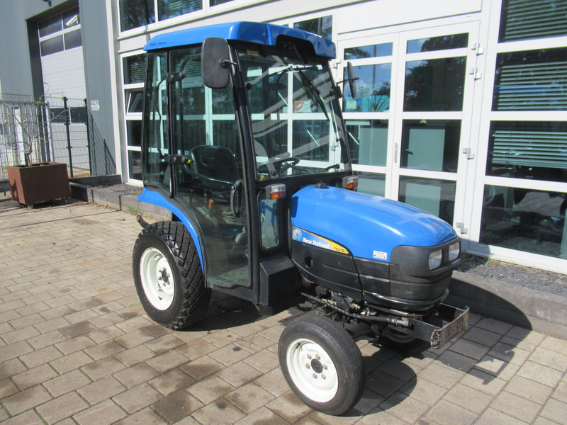 New Holland TC21D 4WD 4x4 Cabine Verwarming - Traktör: fotoğraf 5 New Holland TC21D 4WD 4x4 Cabine Verwarming - Traktör: fotoğraf 5