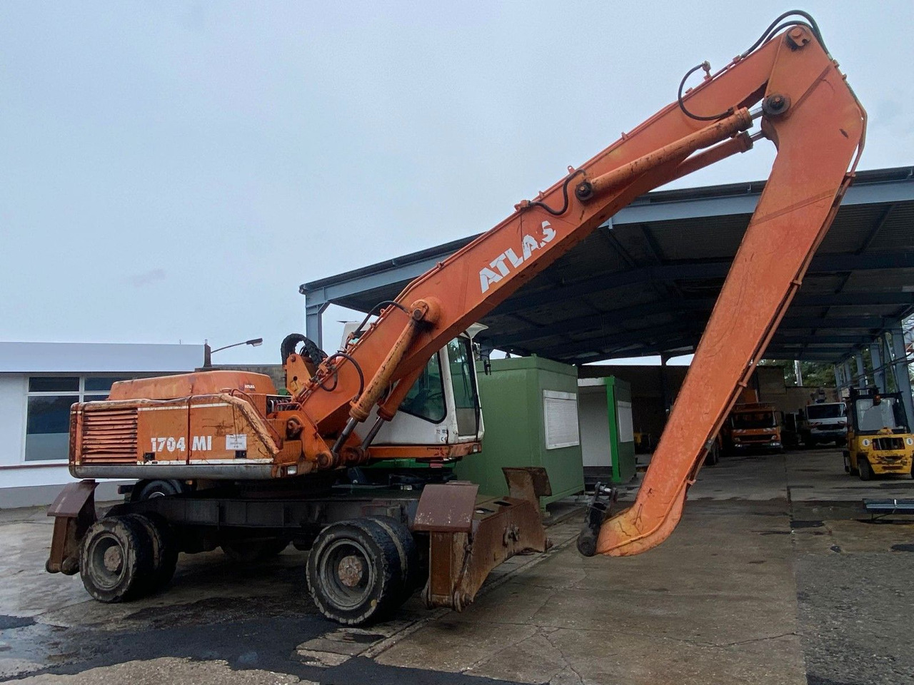 Atlas 1704 MI mit Greifer Umschlagbagger Lang - Tekerlekli ekskavatör: fotoğraf 5 Atlas 1704 MI mit Greifer Umschlagbagger Lang - Tekerlekli ekskavatör: fotoğraf 5