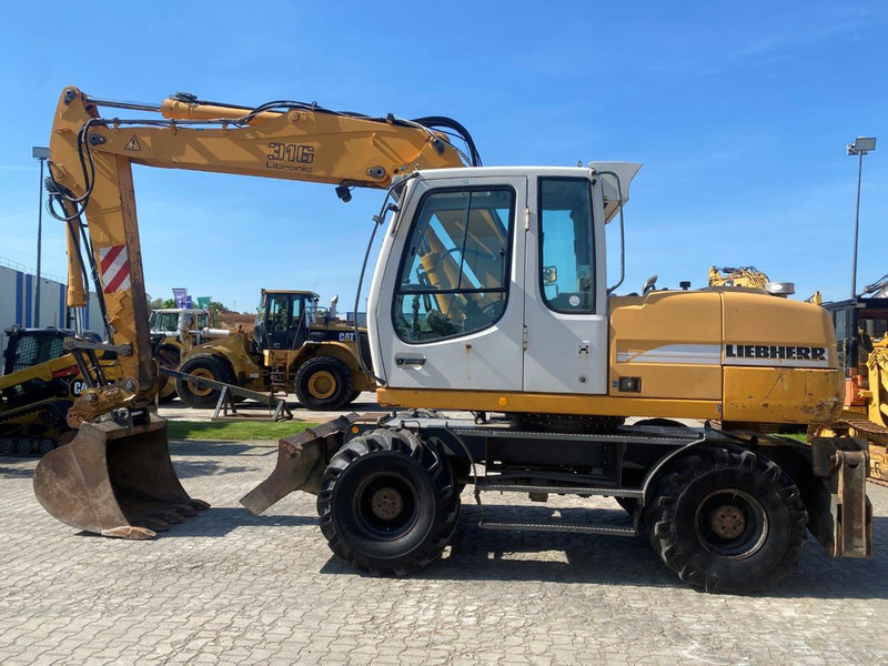 Liebherr A316 Litronic A 316 litronic - Tekerlekli ekskavatör: fotoğraf 2 Liebherr A316 Litronic A 316 litronic - Tekerlekli ekskavatör: fotoğraf 2