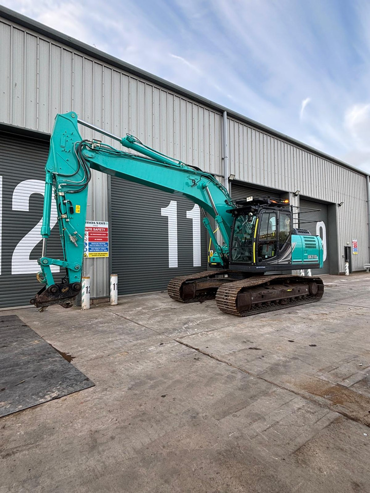 Kobelco SK210LC-11 - Paletli ekskavatör: fotoğraf 1 Kobelco SK210LC-11 - Paletli ekskavatör: fotoğraf 1