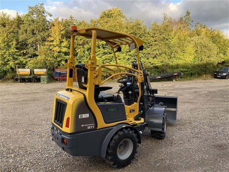 Eurotrac W11 med lang arm, skovl og gafler - Belden kırmalı yükleyici: fotoğraf 3 Eurotrac W11 med lang arm, skovl og gafler - Belden kırmalı yükleyici: fotoğraf 3